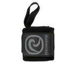 A black Rehband X-RX Wrist Wrap with a flat stitched thumb hook and logo on the strap.