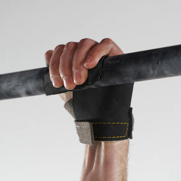 CrossFit athlete using Victory Grips Tactical 3.0 Freedom grips during bar work