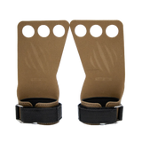 Pair of brown leather wrist straps with by bear komplex, with black buckles on a white background