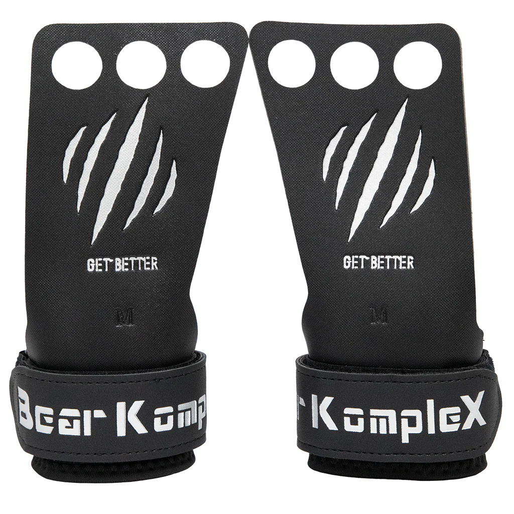 Black wrist wraps with 'Bear KompleX' branding and 'Get Better' text on a white background