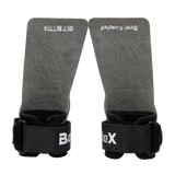 Pair of gray wrist wraps with black straps featuring 'Better' and 'BeefX' branding on a white background.