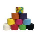 Stack of colourful frog grips tape rolls of tape on a textured dark background