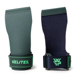 Two wrist guards, one green and one black, with Velites branding on a white background.