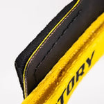 Close-up of a yellow and black victory hand grips 