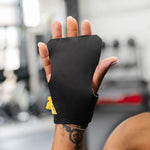 Black victory hand grip on a hand with a blurred background