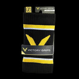 Black wristbands with yellow and white stripes in packaging labeled 'Victory Grips'.