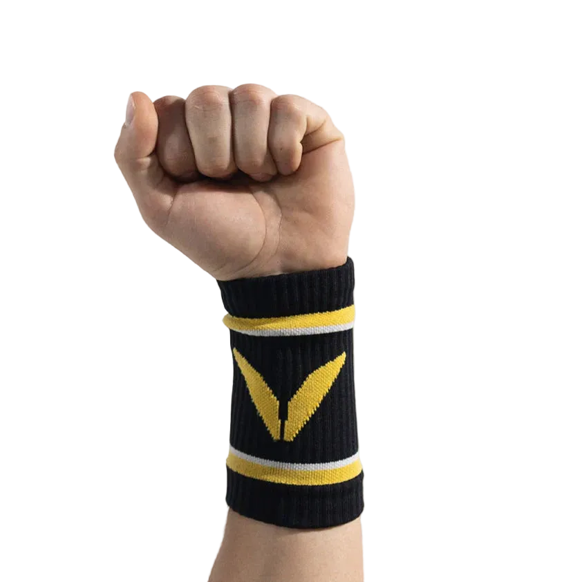 Black wristband with yellow Victory Grips logo on a white background