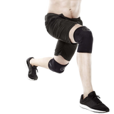 Athlete training in Rehband Rx Knee Sleeves 5mm in carbon black during a lunge - knee compression support for CrossFit and weightlifting
