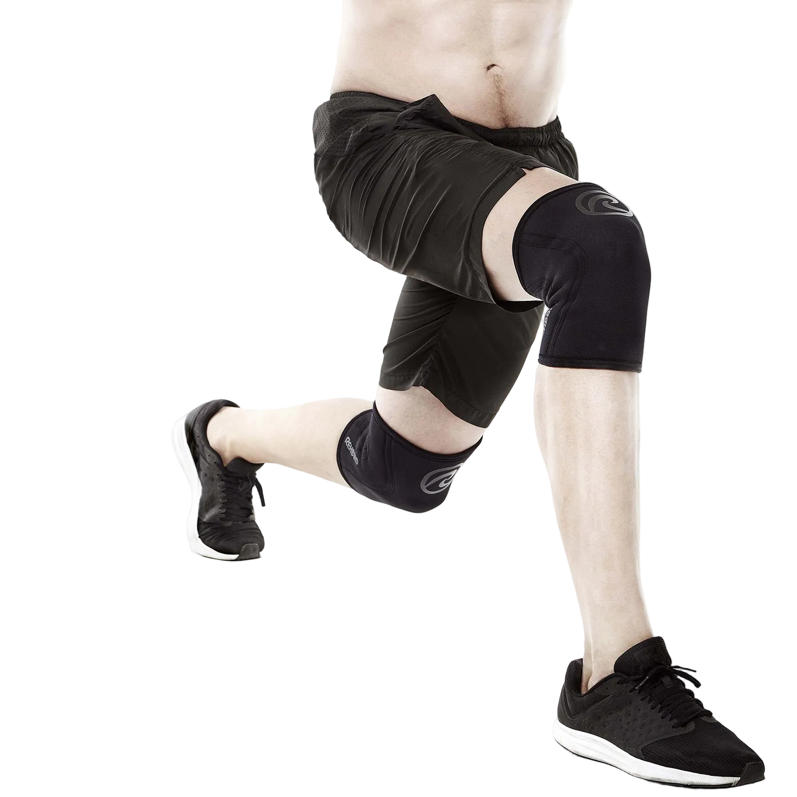 Athlete training in Rehband Rx Knee Sleeves 5mm in carbon black during a lunge - knee compression support for CrossFit and weightlifting